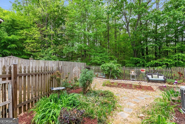 exterior space featuring a fenced backyard