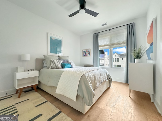 300 Mado Ln, Chattahoochee Hills, GA 30268 - bedroom featuring a ceiling fan, visible vents, wood finished floors, and baseboards