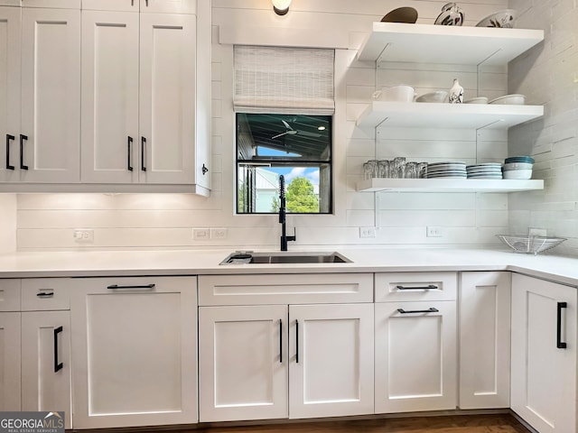 300 Mado Ln, Chattahoochee Hills, GA 30268 - kitchen featuring backsplash, white cabinetry, open shelves, and a sink
