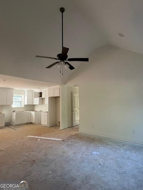 189 Warner Rd, Barnesville, GA 30204 - unfurnished living room with ceiling fan and high vaulted ceiling