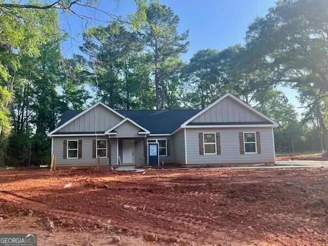 189 Warner Rd, Barnesville, GA 30204 - view of front of house featuring board and batten siding and a porch