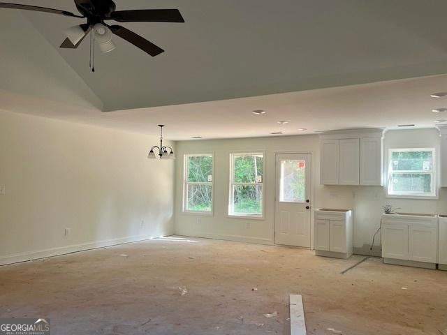 189 Warner Rd, Barnesville, GA 30204 - unfurnished living room with a chandelier and a ceiling fan