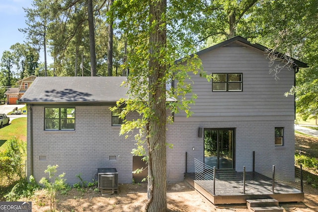 2302 Aurie Dr, Decatur, GA 30034 - back of property featuring a wooden deck, cooling unit, and brick siding