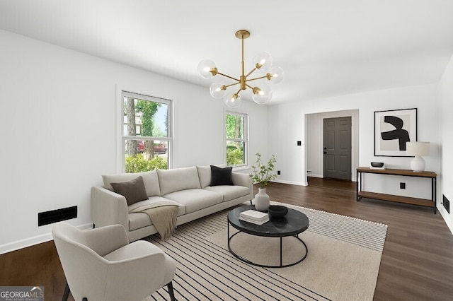 2302 Aurie Dr, Decatur, GA 30034 - living room with a chandelier, wood finished floors, and baseboards
