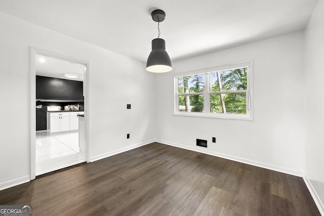 2302 Aurie Dr, Decatur, GA 30034 - empty room featuring dark wood-style floors and baseboards