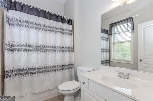 bathroom with shower / bathtub combination with curtain, toilet, tile patterned flooring, and vanity