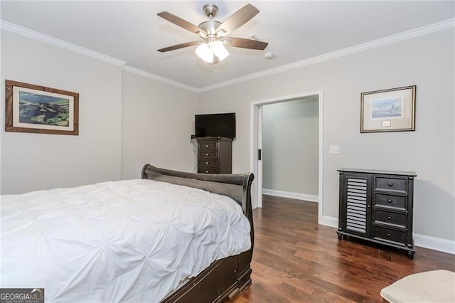 bedroom featuring crown molding, ceiling fan, wood finished floors, and baseboards