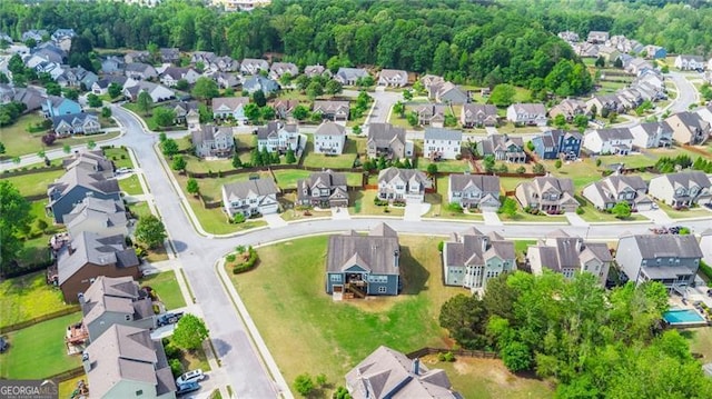 birds eye view of property with a residential view