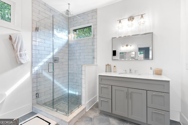 1671 Laurel Ave NW, Atlanta, GA 30318 - bathroom featuring vanity, baseboards, and a stall shower