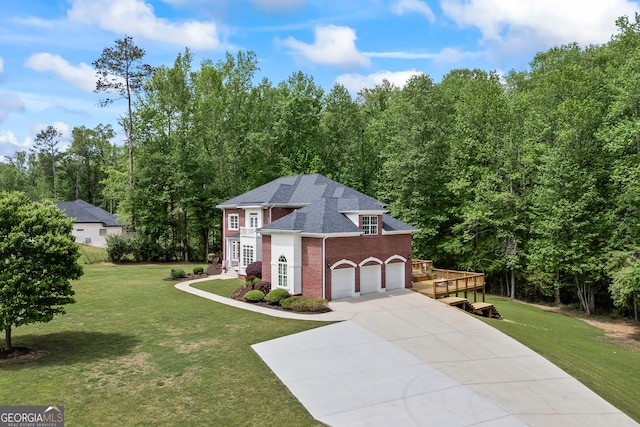 139 Thornhill Cir, Athens, GA 30607 - view of front of house with a garage, concrete driveway, a front lawn, and brick siding