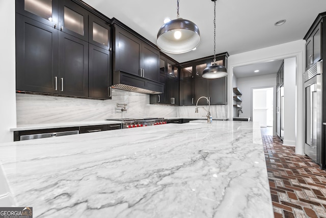 139 Thornhill Cir, Athens, GA 30607 - kitchen with backsplash, light stone countertops, a sink, brick floor, and stainless steel appliances