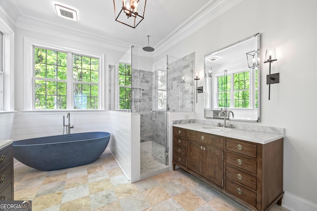 139 Thornhill Cir, Athens, GA 30607 - bathroom featuring a soaking tub, a shower stall, ornamental molding, and vanity