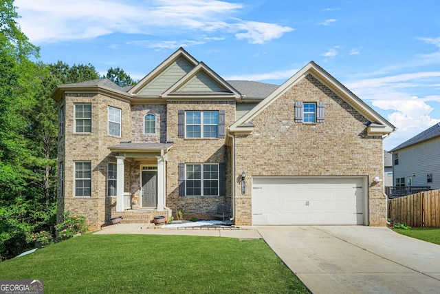 15 Manas Ct, Covington, GA 30016 - craftsman inspired home with driveway, fence, brick siding, a front lawn, and a garage