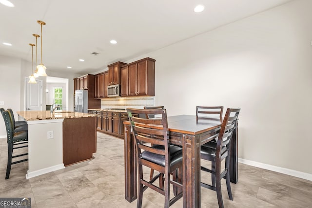 15 Manas Ct, Covington, GA 30016 - dining room with baseboards, recessed lighting, and visible vents