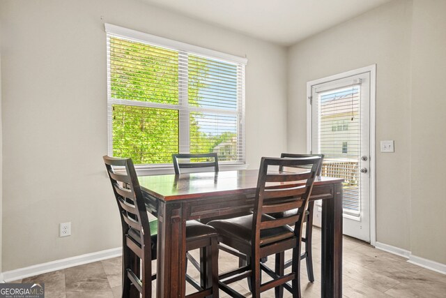 15 Manas Ct, Covington, GA 30016 - dining space with plenty of natural light and baseboards