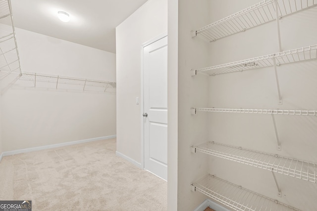 15 Manas Ct, Covington, GA 30016 - spacious closet featuring carpet floors