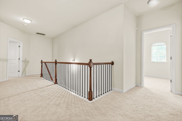 15 Manas Ct, Covington, GA 30016 - hall with baseboards, visible vents, and carpet flooring