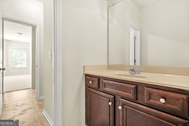 15 Manas Ct, Covington, GA 30016 - bathroom with vanity and baseboards