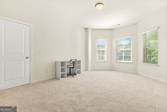 15 Manas Ct, Covington, GA 30016 - interior space with carpet flooring, visible vents, and baseboards