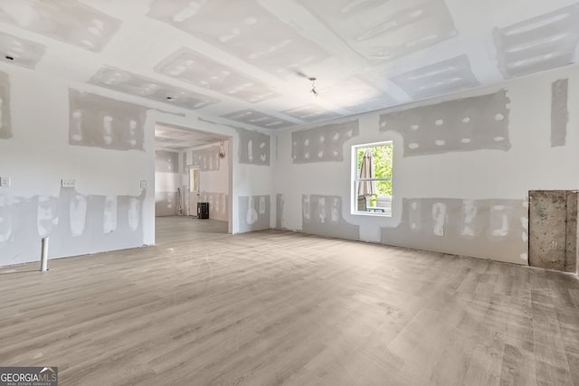 15 Manas Ct, Covington, GA 30016 - unfurnished living room with wood finished floors