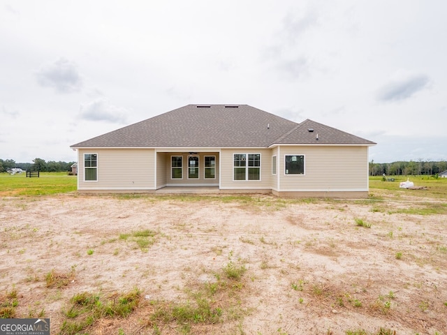 153 Lakeridge Dr, Adel, GA 31620 - rear view of house with a ceiling fan and a patio area
