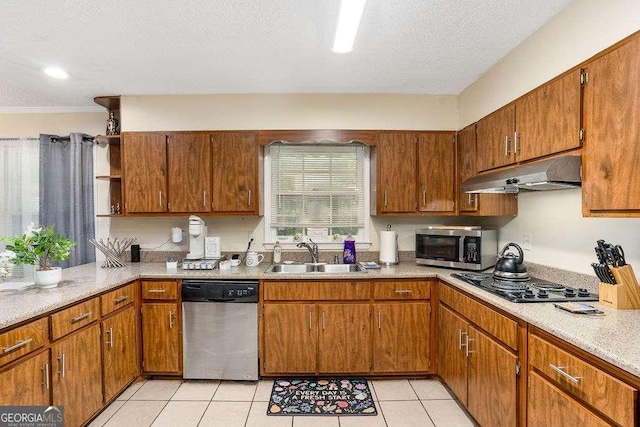 4393 Housworth Dr, Stonecrest, GA 30038 - kitchen featuring a sink, under cabinet range hood, open shelves, a textured ceiling, and appliances with stainless steel finishes