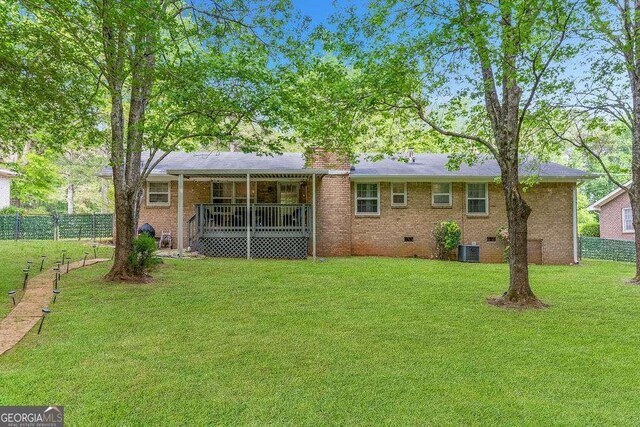 4393 Housworth Dr, Stonecrest, GA 30038 - rear view of property featuring fence, a yard, and crawl space
