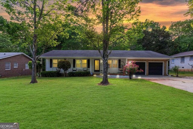 4393 Housworth Dr, Stonecrest, GA 30038 - ranch-style house featuring a garage, a porch, a front lawn, and concrete driveway