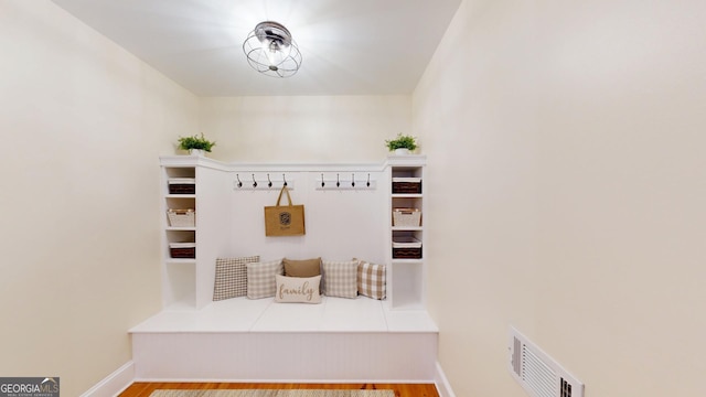 2897 Macaw St NW, Atlanta, GA 30318 - mudroom featuring baseboards, visible vents, and wood finished floors