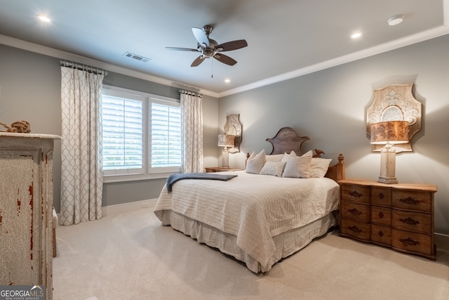 carpeted bedroom featuring recessed lighting, baseboards, visible vents, a ceiling fan, and crown molding