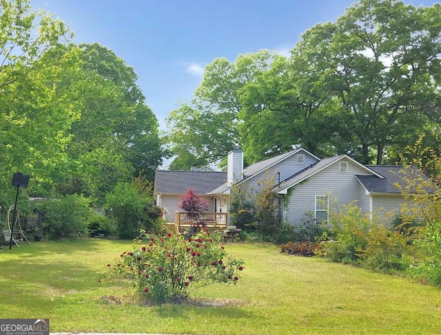 view of yard with a deck