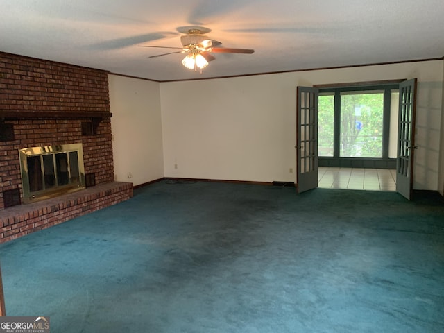 96 Glencrest Dr, Toccoa, GA 30577 - unfurnished living room featuring a brick fireplace, a ceiling fan, carpet flooring, and baseboards