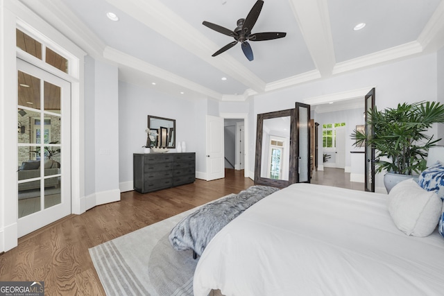 bedroom with beam ceiling, recessed lighting, and wood finished floors