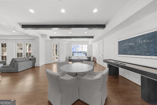 dining room featuring dark wood finished floors, recessed lighting, beamed ceiling, and baseboards