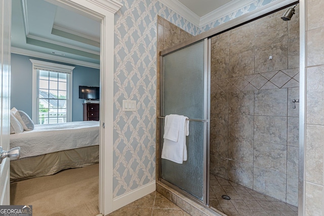 ensuite bathroom with ornamental molding, connected bathroom, and a stall shower