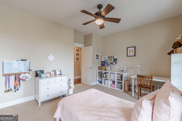 bedroom with baseboards, visible vents, light carpet, and ceiling fan