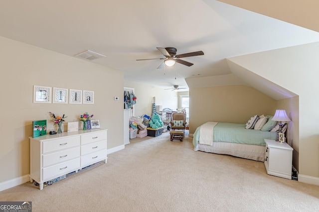 bedroom featuring baseboards, visible vents, ceiling fan, and light colored carpet