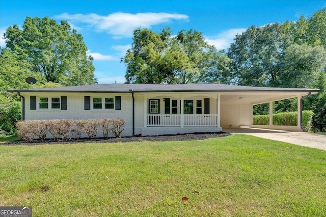 3951 Lindley Dr, Powder Springs, GA 30127 - view of front facade with concrete driveway, a front lawn, a carport, and brick siding