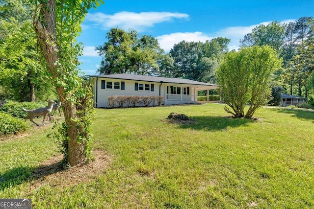 3951 Lindley Dr, Powder Springs, GA 30127 - view of front of home with a front yard