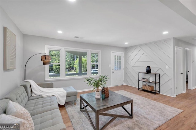 3951 Lindley Dr, Powder Springs, GA 30127 - living room with light wood-style flooring, recessed lighting, and baseboards