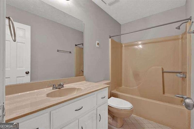 full bath featuring vanity, shower / bathtub combination, toilet, a textured ceiling, and tile patterned flooring