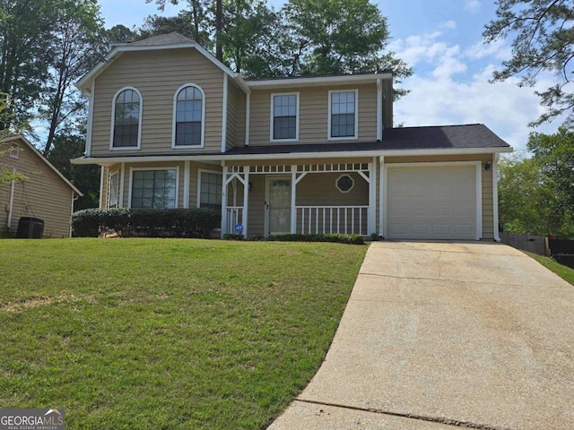 5229 Mountain Village Ct, Stone Mountain, GA 30083 - view of front of home featuring a porch, a front yard, driveway, and a garage