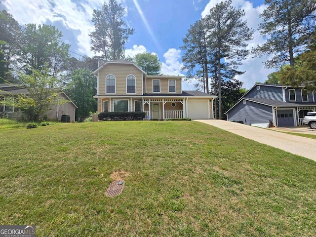 5229 Mountain Village Ct, Stone Mountain, GA 30083 - view of front of property with concrete driveway, a front yard, an attached garage, and covered porch