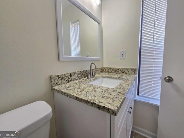 5229 Mountain Village Ct, Stone Mountain, GA 30083 - bathroom featuring toilet and vanity