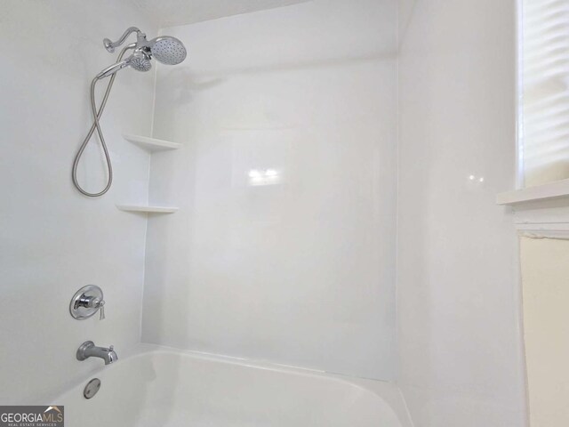 5229 Mountain Village Ct, Stone Mountain, GA 30083 - bathroom featuring washtub / shower combination