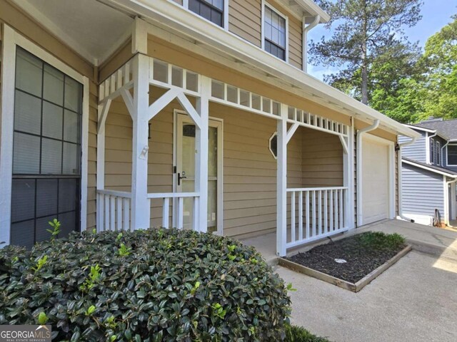 5229 Mountain Village Ct, Stone Mountain, GA 30083 - entrance to property featuring covered porch
