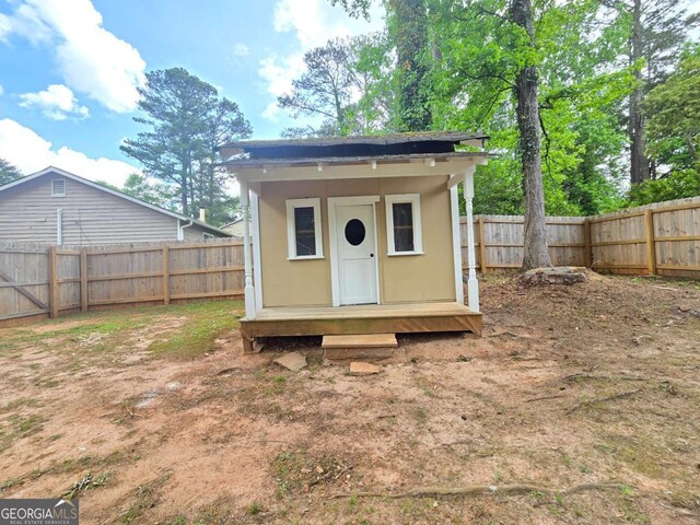 5229 Mountain Village Ct, Stone Mountain, GA 30083 - view of outdoor structure with a fenced backyard and an outbuilding