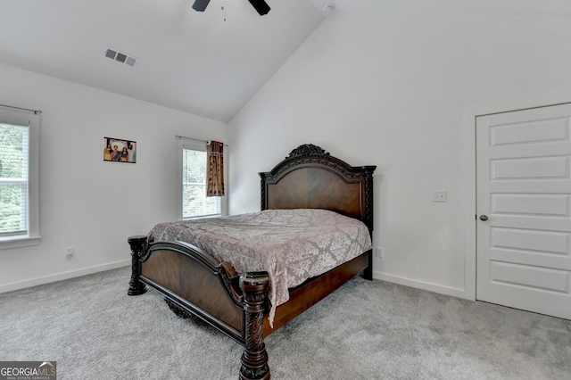 carpeted bedroom with a ceiling fan, visible vents, vaulted ceiling, and baseboards
