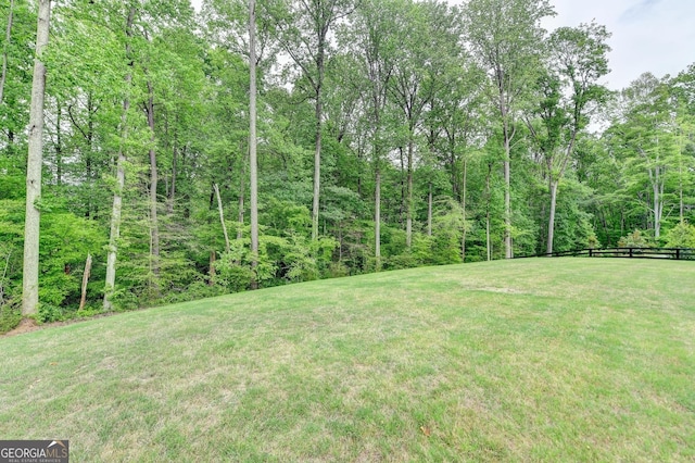 view of yard with fence