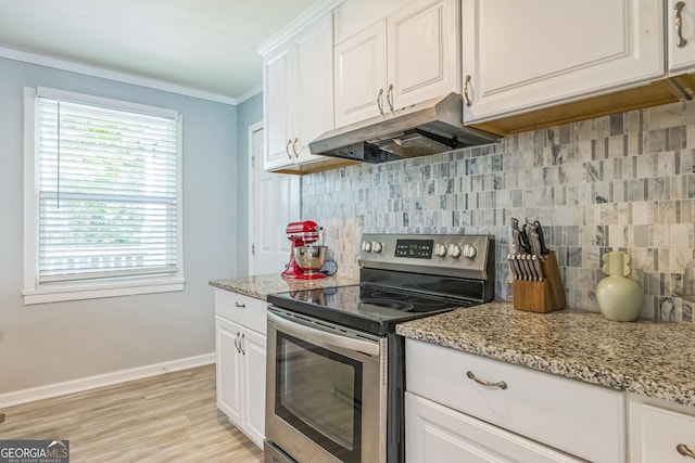 kitchen featuring white cabinetry, stainless steel range with electric stovetop, under cabinet range hood, and decorative backsplash